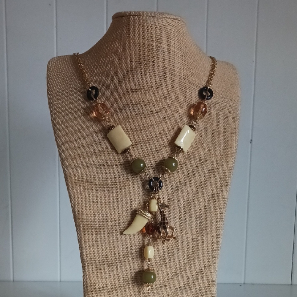Kenneth Jay Lane Long Giraffe Multi Charms Necklace.